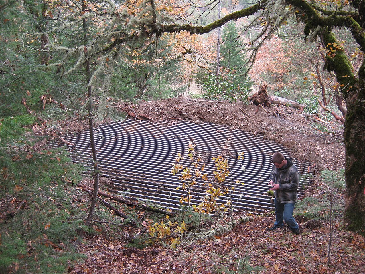 Fenced-off entrance of an abandoned mine