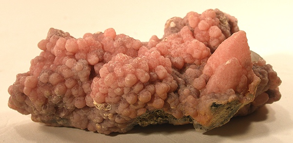 Pink botryoidal rhodochrosite specimen