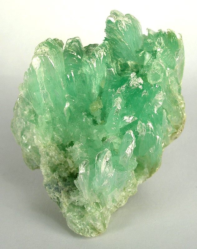 Foliated pale green talc specimen