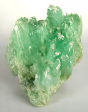 Foliated pale green talc specimen